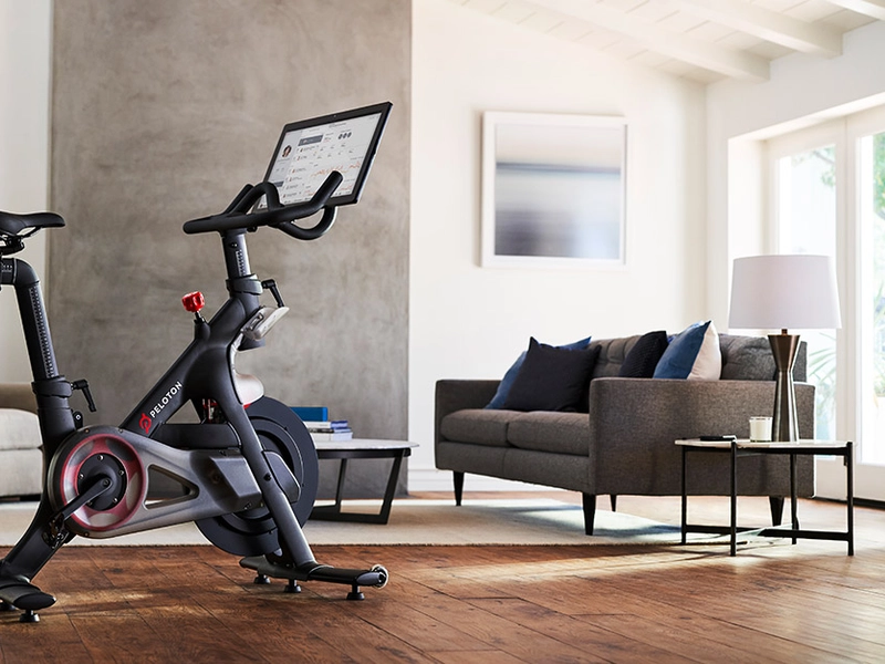Image of a peloton bicycle in a Livingroom. Setup your Peloton