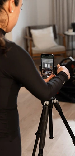 Women recording video with her phone