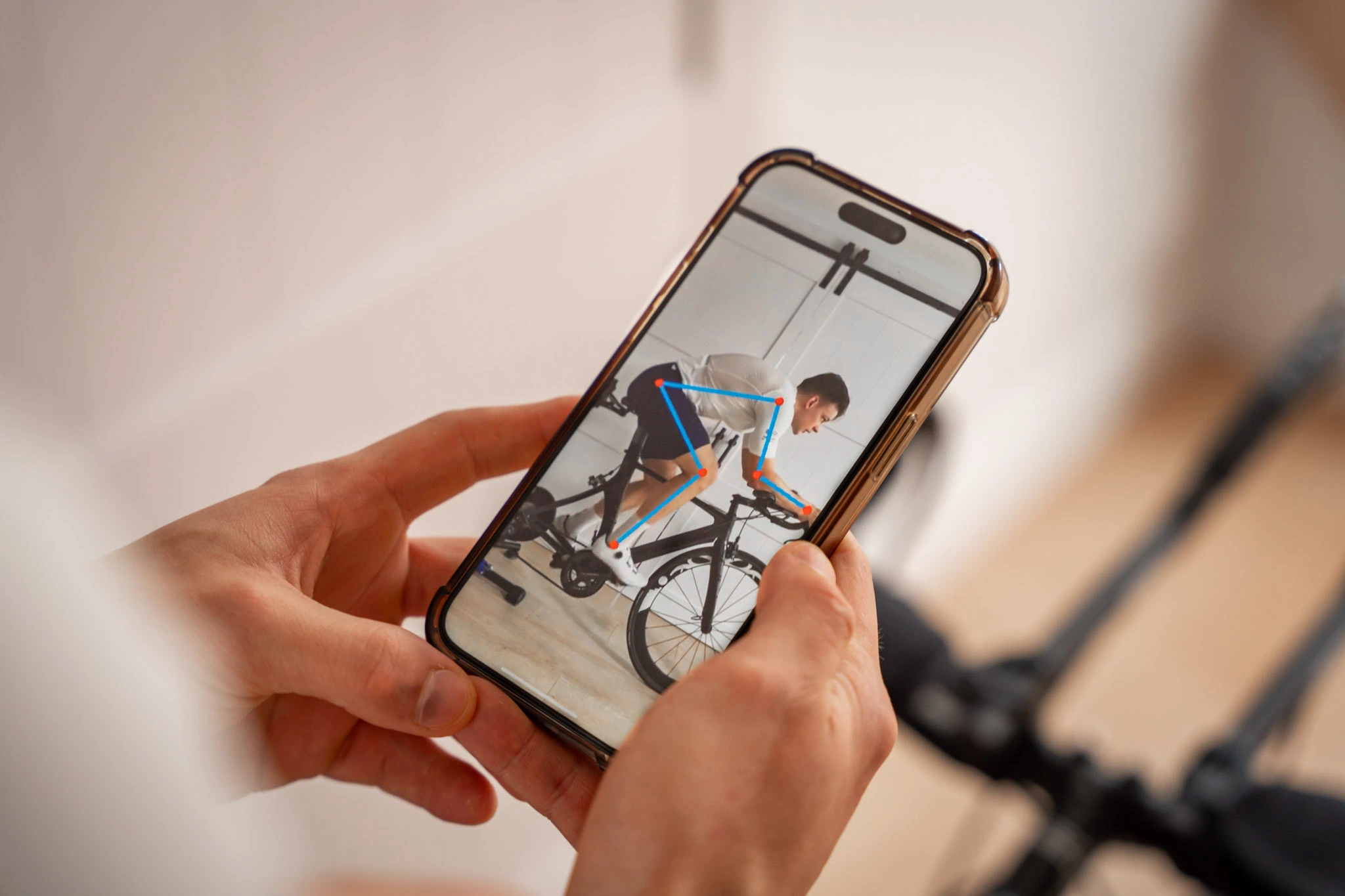 Cyclist riding on a stationary trainer during a MyVeloFit bike fit session.
